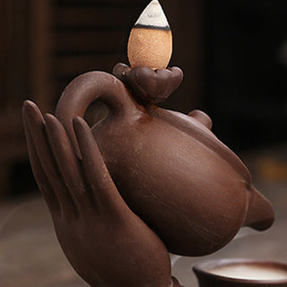 Buddha Gift Buddha Hand Holding Teapot Cup Ceramic Backflow Smoke Fountain Healing Incense Burner Decoration