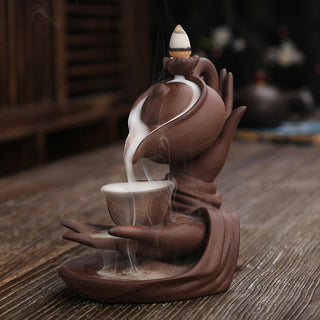 Buddha Gift Buddha Hand Holding Teapot Cup Ceramic Backflow Smoke Fountain Healing Incense Burner Decoration